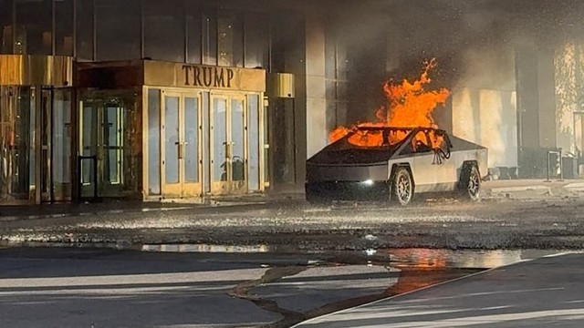 An image of an exploded Tesla burning next to a Trump tower which can now be seen as being related to the Musk Trump messy public breakup