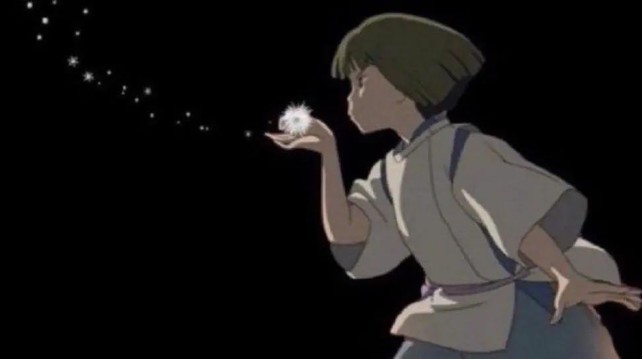 Ein Bild eines Anime-Jungen aus Chihiros Reise ins Zauberland, der einen Löwenzahn bläst, was dazu führt, dass die oben geschriebene Textkunst mit den Worten  „Fuck Merz” entsteht